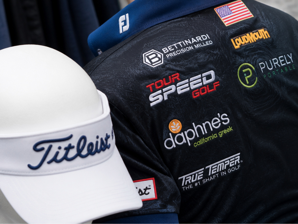 Close-up of branded golf apparel and visor showing sponsor logo evolution